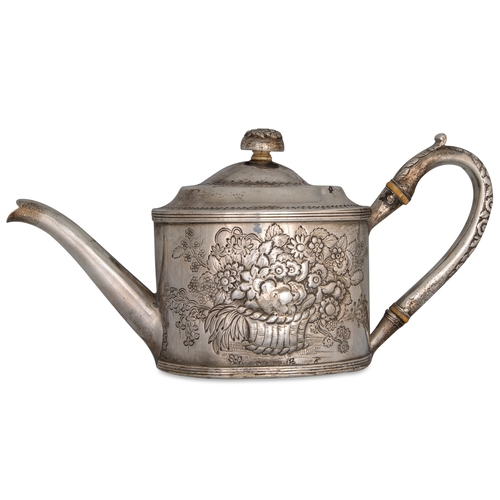 404 - A GEORGE II IRISH SILVER TEA POT, with later embossed decoration, Dublin 1730, 608 g.