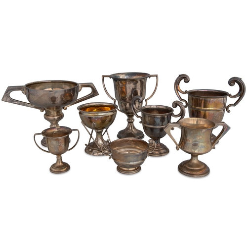 410 - A COLLECTION OF EIGHTH STERLING SILVER TROPHY CUPS, various sizes, all plain, and hall marked, 698 g... 