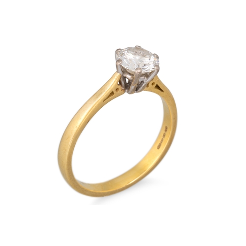 109 - A DIAMOND SOLITAIRE RING, the round brilliant cut diamond mounted in 18ct yellow gold. Estimated: we... 