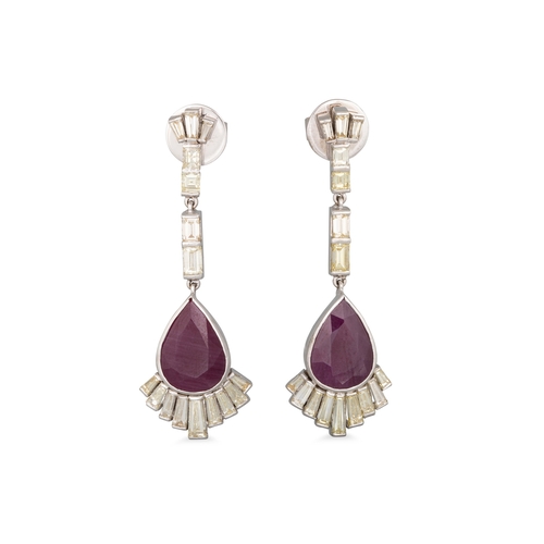 126 - A PAIR OF RUBY AND DIAMOND DROP EARRINGS, the baguette cut diamond lines suspending pear shaped rubi... 