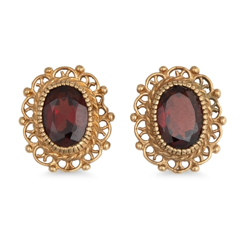 13 - A PAIR OF GARNET AND GOLD EARRINGS, the oval garnet to 9ct yellow gold mount