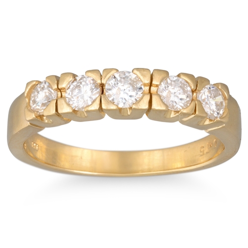 131 - A FIVE STONE DIAMOND RING, the brilliant cut diamonds mounted in 14ct yellow gold. Estimated: weight... 