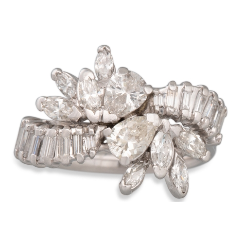 139 - A DIAMOND CLUSTER RING, set with pear, marquise and baguette cut diamonds, mounted in platinum. Esti... 