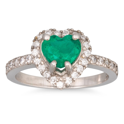 152 - A COLOMBIAN EMERALD AND DIAMOND CLUSTER RING, the heart shaped emerald to brilliant cut diamond surr... 