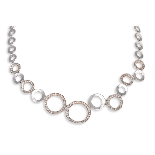 164 - AN 18CT WHITE GOLD GRADUATED NECK CHAIN, hinged circular links, some diamond set, 27 g. 17