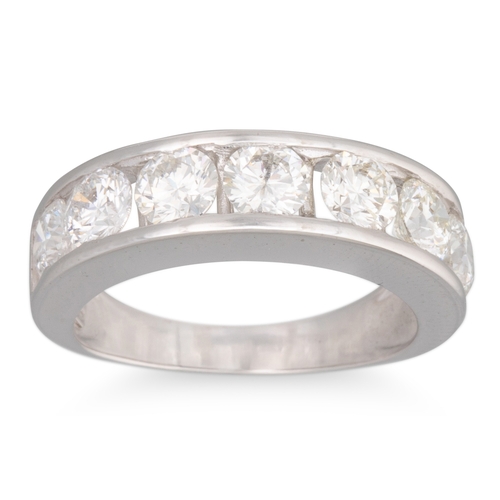 174 - A DIAMOND HALF ETERNITY RING, the seven brilliant cut diamonds mounted in 18ct white gold. Estimated... 