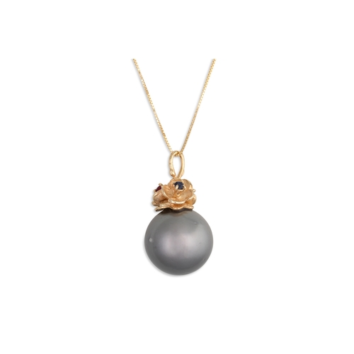 191 - A TAHITIAN PEARL PENDANT, mounted in 14ct yellow gold, on a 18ct yellow gold chain