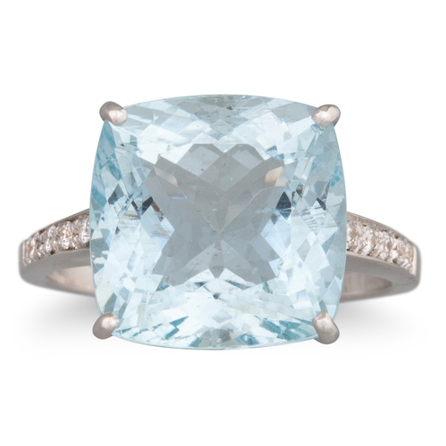 195 - AN AQUAMARINE AND DIAMOND RING, the cushion cut aquamarine to diamond shoulders, mounted in 18ct whi... 