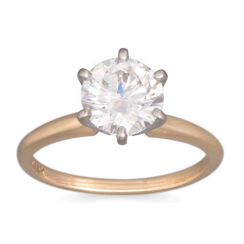 205 - A DIAMOND SOLITAIRE RING, the round brilliant cut diamond mounted in 14ct yellow gold. Together with... 