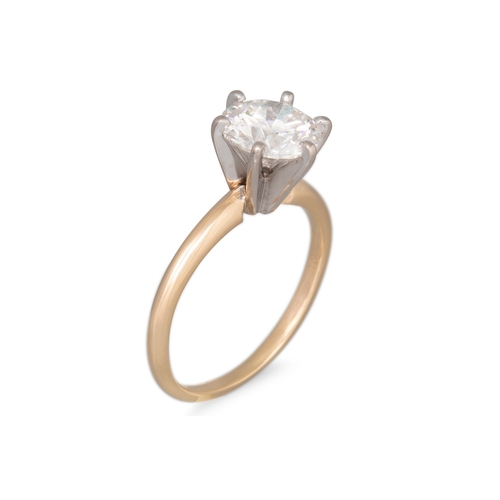 205 - A DIAMOND SOLITAIRE RING, the round brilliant cut diamond mounted in 14ct yellow gold. Together with... 