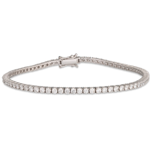 212 - A DIAMOND LINE BRACELET, the brilliant cut diamonds mounted in 18ct white gold. Estimated: weight of... 