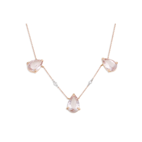 219 - A MORGANITE AND DIAMOND NECKLACE, set with three pear shaped morganites to diamond spacers, in rose ... 