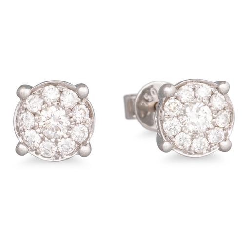 229 - A PAIR OF DIAMOND CLUSTER EARRINGS, mounted in 18ct white gold. Estimated: weight of diamonds: 0.50 ... 