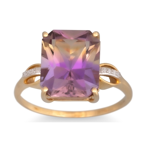 23 - AN AMETHYST DRESS RING, the rectangular amethyst to diamond shoulders, mounted in 9ct yellow gold, s... 