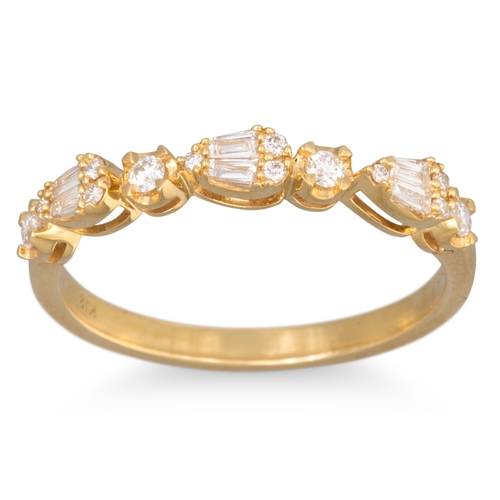 231 - A DIAMOND SET HALF ETERNITY RING, set with brilliant and baguette cut stones, size M
... 