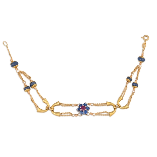 247 - A RUBY AND SAPPHIRE BRACELET, the central cluster to 18ct yellow gold chain with gold and gem spacer... 