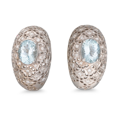 248 - A PAIR OF OVAL AQUAMARINE EARRINGS, to openwork diamond surrounds, in 18ct white gold