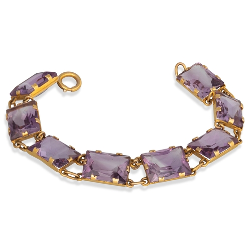 30 - A VINTAGE AMETHYST SET BRACELET, the rectangular amethyst set in 9ct yellow gold, stamped 'Scotland'