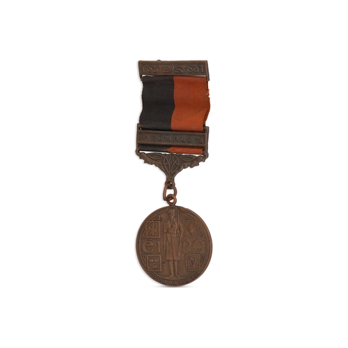 348 - A 1919-1921 IRISH WAR OF INDEPENDENCE BLACK AND TAN MEDAL, with comhrac bar & original ribbon, engra... 