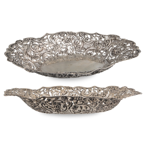 396 - A PAIR OF LATE VICTORIAN OVAL SILVER EMBOSSED OPEN BASKETS, London 1899, ca 10