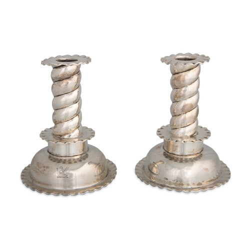 397 - A PAIR OF LATE VICTORIAN SILVER CANDLE STICKS, in the Jacobean style, London 1890, 5