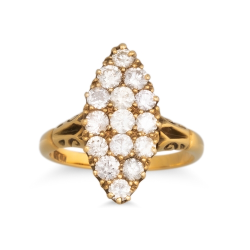 52 - A BOAT SHAPED DIAMOND CLUSTER RING, set with brilliant cut diamonds mounted in 18ct yellow gold. Est... 