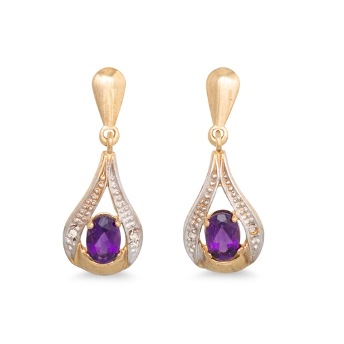 55 - A PAIR OF AMETHYST AND GOLD DROP EARRINGS, the oval amethyst set in pear shaped gold setting