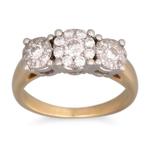 56 - A DIAMOND TRIPLE CLUSTER RING, the three clusters mounted in 9ct yellow gold, size I-J. Estimated: w... 