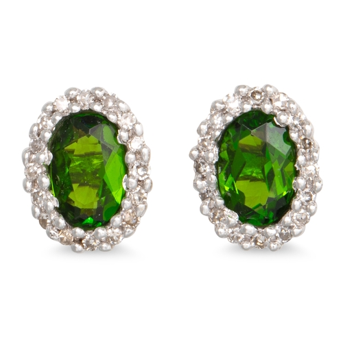 57 - A PAIR OF DIOPSIDE AND DIAMOND EARRINGS, the oval diopside to diamond surround, mounted in gold