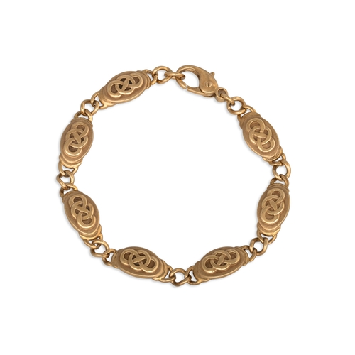 64 - A 9CT YELLOW GOLD CELTIC DESIGN BRACELET, 20 g.