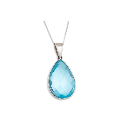 78 - A TOPAZ PENDANT, the pear shaped topaz mounted in white gold, on a 9ct white gold chain