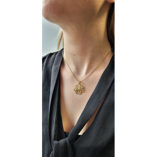 114 - A DIAMOND SET PENDANT AND CHAIN, applied motifs with butterflies, in 14ct yellow gold. Estimated: we... 