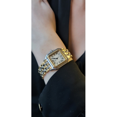 332 - A LADY'S STAINLESS STEEL CARTIER PANTHERE STAINLESS STEEL WRISTWATCH, cream face date with Roman num... 