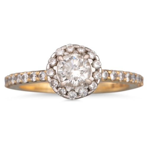 135 - A DIAMOND SOLITAIRE RING, the round brilliant cut diamond to round brilliant cut diamond surround an... 