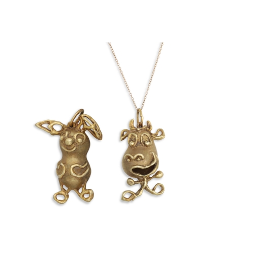136 - TWO 1970'S 14CT GOLD PENDANTS, in abstract form of cow and rabbit, together with a 9ct chain, weight... 