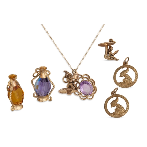 140 - FOUR VINTAGE 9CT GOLD CHARMS, 9.2 g., together with two further glass set charms, and a stone set pe... 