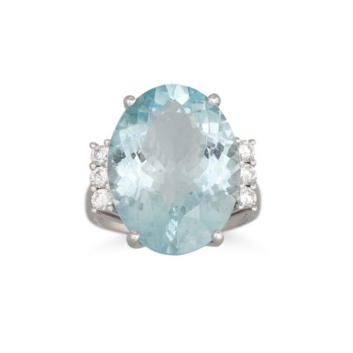 144 - AN AQUAMARINE AND DIAMOND RING, the large oval aquamarine to diamond shoulders, mounted in 18ct whit... 