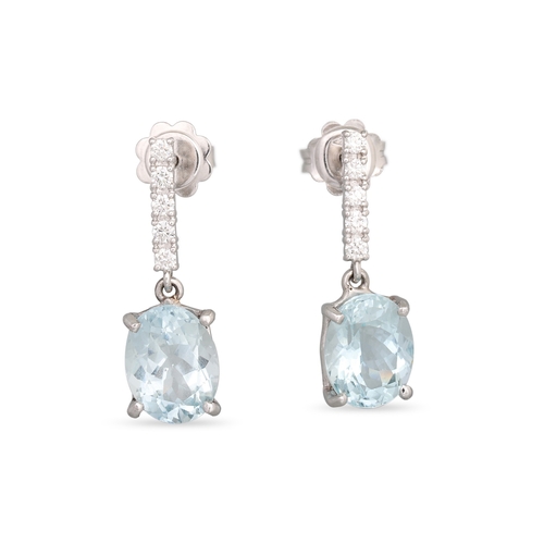 179 - A PAIR OF AQUAMARINE AND DIAMOND EARRINGS, each line of diamonds suspending an aquamarine, mounted i... 