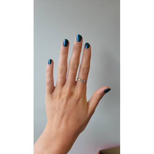 182 - AN ANTIQUE THREE STONE DIAMOND RING, the oval cut diamonds collet set in 18ct yellow gold. Estimated... 