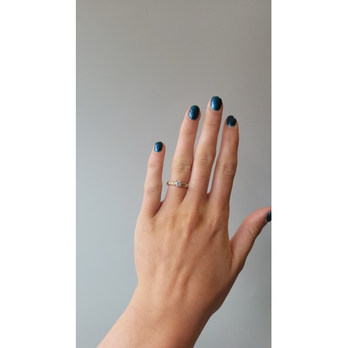 161 - A DIAMOND SOLITAIRE RING, the brilliant cut diamond mounted in 18ct yellow gold. Size L... 