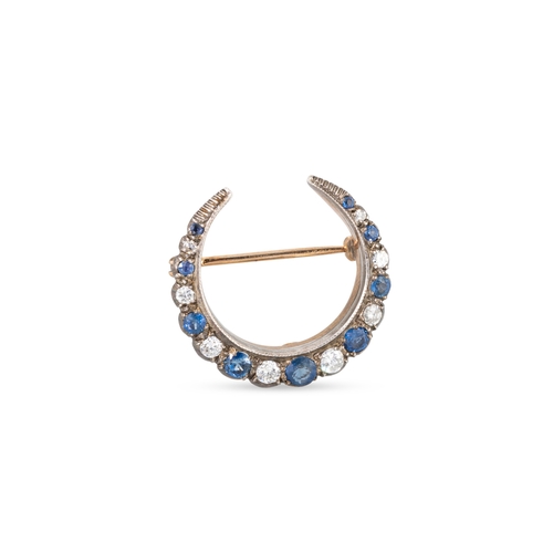 355 - AN ANTIQUE DIAMOND AND SAPPHIRE CRESCENT BROOCH, mounted in silver & gold