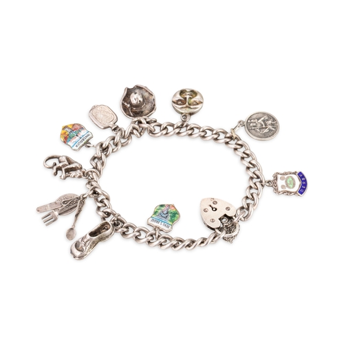 1 - TWO VINTAGE SILVER CHARM BRACELETS, various charms, mostly silver, 79 g. gross weight