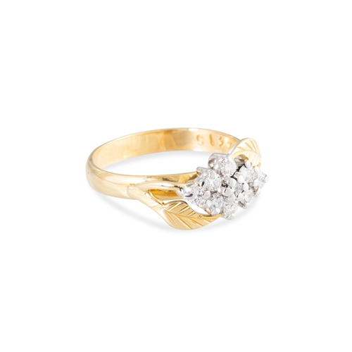 29 - AN IRISH DESIGNER RING, clusters of diamonds flanked by stylised leaf design to an 18ct yellow gold ... 