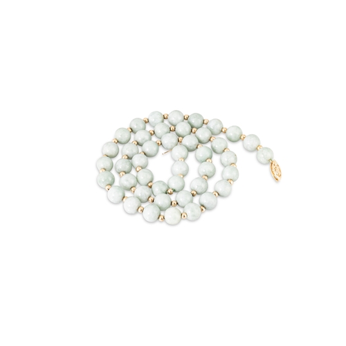36 - A JADE SET BEADED NECKLACE, with 14ct yellow gold fittings and clasp. Length ca. 17