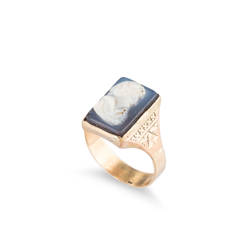 42 - AN ANTIQUE INTAGLIO SET RING, the intaglio depicting a profile of a lady mounted in 9 ct gold, with ... 
