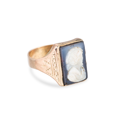 42 - AN ANTIQUE INTAGLIO SET RING, the intaglio depicting a profile of a lady mounted in 9 ct gold, with ... 
