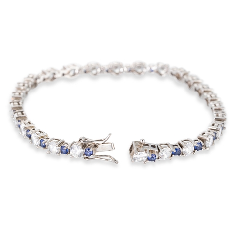 60 - A CUBIC ZIRCONIA SET TENNIS BRACELET, silver mounted