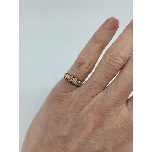 397 - AN ANTIQUE FIVE STONE DIAMOND RING, the old cut diamonds mounted in 18ct yellow gold. Estimated: wei... 