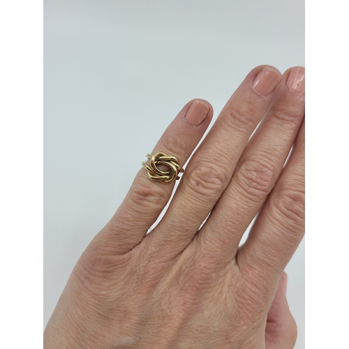 48 - A 9CT YELLOW GOLD PUZZLE RING, 4.2 g.