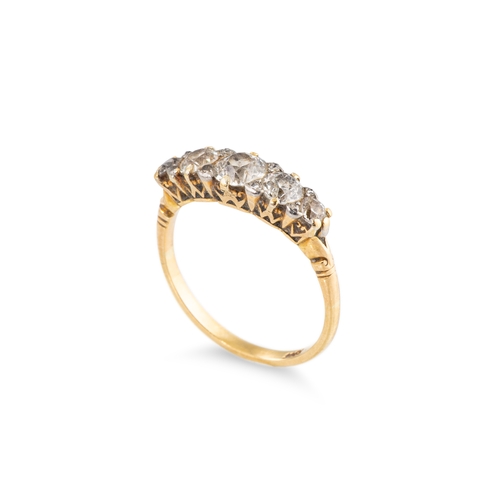 34 - A GRADUATED FIVE STONE DIAMOND RING, mounted in a carved 18ct yellow gold mount. Estimated: 1.80 ct,... 